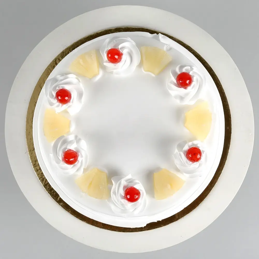 Pineapple Eggless Cake- 500 gms — image 1